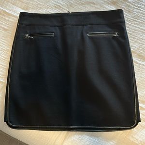 Black wool skirt with leather trim piping